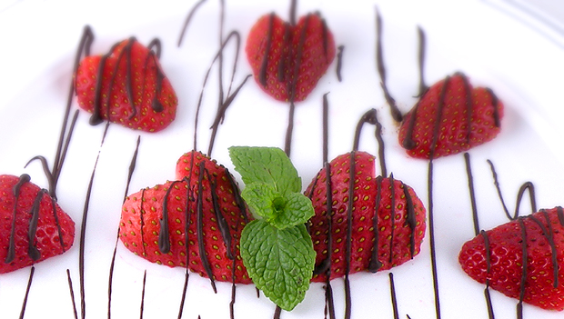 strawberry hearts drizzled with chocolate
