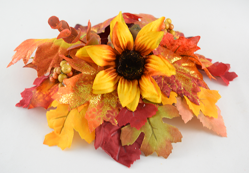 DIY Candle Ring Centerpiece with fall flowers and leaves