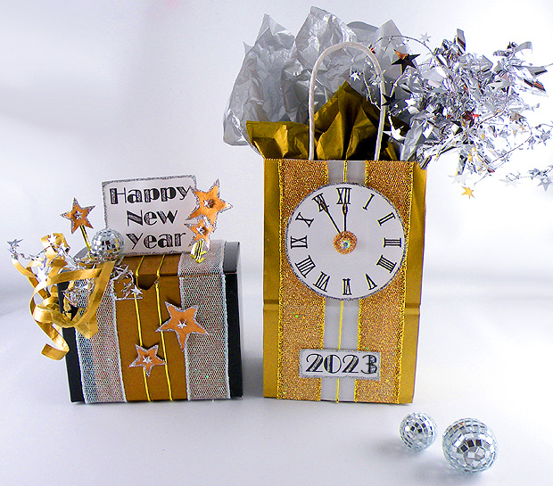 Gold glittery gift box and gift bag 2023