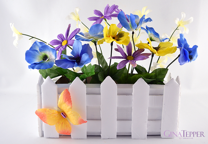 Tabletop hite Picket Fence Planter Filled with Spring Flowers