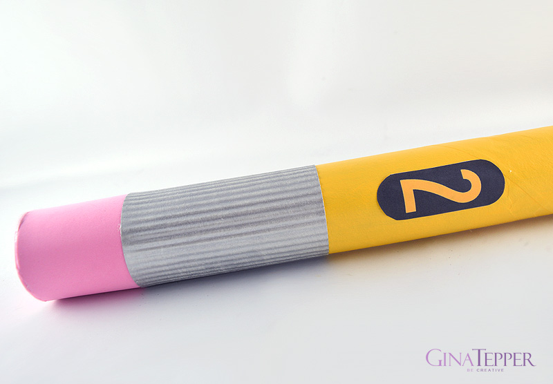 Giant pencil eraser, metal band and then number 2