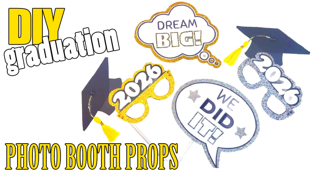 DIY graduation party photo booth props including graduation caps, 2026 glasses, and speech bubbles with 'Dream Big' and 'We Did It' text.