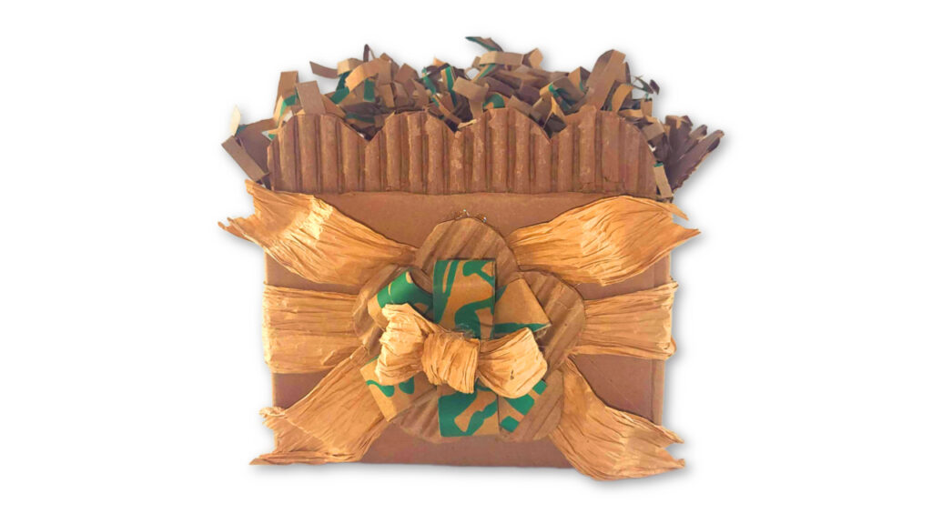 DIY boutique gift box with handcrafted corrugated cardboard flower embellishment and raffia bow.
