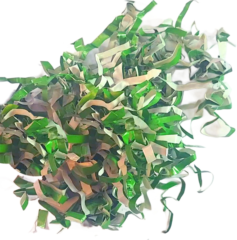 Boutique-style DIY gift filler created from hand-shredded wrapping paper, showing a vibrant crinkle texture for high-end gift basket presentation.