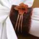 Bronze napkin ring accented with a copper leaf and beads