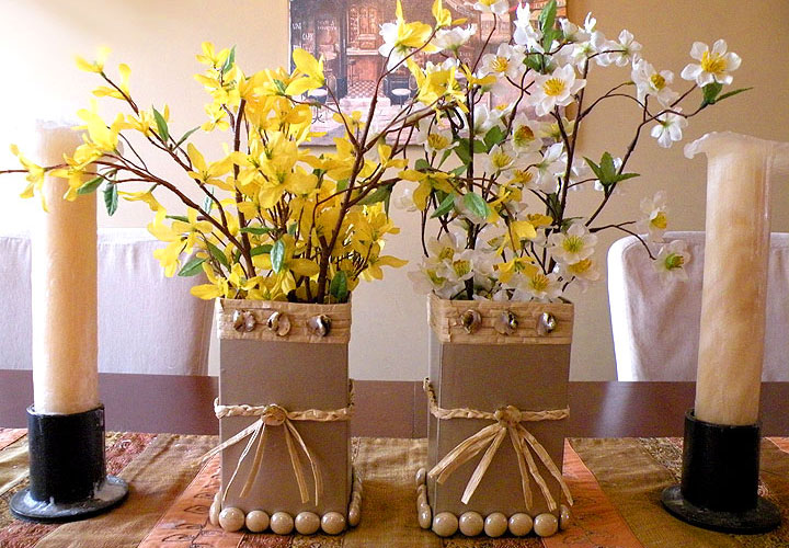 Milk Carton Vases fill with yellow and white Spring flowers