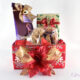 Christmas box decoratated with red wraping paper, snowflakes ribbon and filled with gifts