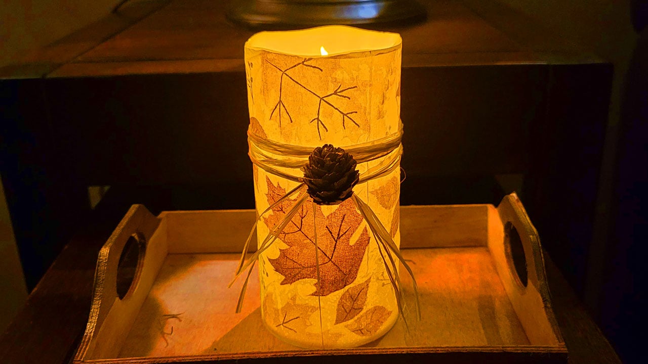 Dollar Tree fall candle decorated with napkin decoupage