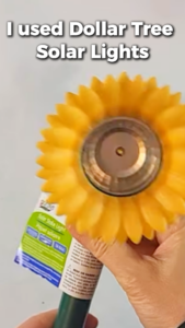 Dollar Tree solar light with sunflower decoration for a DIY garden light